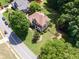 Gorgeous aerial view of large house with manicured front lawn at 1348 Bridgemill Ave, Canton, GA 30114