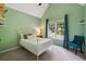 Charming bedroom with carpet, high ceiling, large window, and a comfy chair at 1348 Bridgemill Ave, Canton, GA 30114