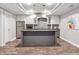 Beautiful basement kitchen with a large island, updated appliances and modern cabinets at 1348 Bridgemill Ave, Canton, GA 30114