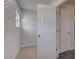 Walk-in closet features carpet flooring and white wire shelving at 281 Chiswick Loop, Stockbridge, GA 30281