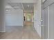 Bright foyer with hardwood floors, an elegant chandelier, and an open floor plan at 281 Chiswick Loop, Stockbridge, GA 30281