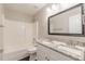 Bathroom featuring a double sink with granite countertops, and a shower-tub combo at 363 Chadwick Cmn, Stockbridge, GA 30281
