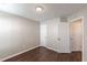 This bright bedroom features laminate floors and white doors, creating a welcoming space at 363 Chadwick Cmn, Stockbridge, GA 30281