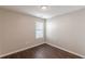 This comfortable bedroom with laminate floors is illuminated by natural light through a window at 363 Chadwick Cmn, Stockbridge, GA 30281