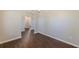 Bright dining room features hardwood floors, neutral walls and modern chandelier lighting at 363 Chadwick Cmn, Stockbridge, GA 30281