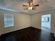 Spacious main bedroom with tray ceiling, ceiling fan, and an ensuite bathroom at 363 Chadwick, Stockbridge, GA 30281