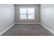 Bedroom with neutral carpet and window with blinds at 4183 May Apple Ln, Atlanta, GA 30349