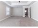 Spacious bedroom with two windows and a view into the hallway at 4183 May Apple Ln, Atlanta, GA 30349