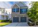 Charming two-story home features a brick facade and a two-car garage at 4183 May Apple Ln, Atlanta, GA 30349