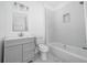 Bright bathroom featuring a shower and tub combo with clean, modern fixtures at 140 Racine Sw St, Atlanta, GA 30314
