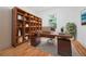 Bright home office with hardwood floors, custom shelving, and ample workspace at 140 Racine Sw St, Atlanta, GA 30314