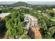 Aerial view of new construction townhomes in a wooded area at 162 Bluffington Way, Marietta, GA 30066