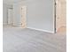Spacious bedroom showcasing soft carpet, neutral color palette, and multiple entrances at 162 Bluffington Way, Marietta, GA 30066