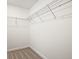 Spacious walk-in closet with custom shelving and ample storage space at 162 Bluffington Way, Marietta, GA 30066
