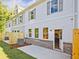 Townhome with gray shutters, brick foundation, and private outdoor area at 162 Bluffington Way, Marietta, GA 30066