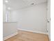 Upstairs hallway with wood floors and natural light near the bedroom at 162 Bluffington Way, Marietta, GA 30066