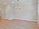 Spacious living room with bright lighting, hardwood floors, and neutral color palette at 162 Bluffington Way, Marietta, GA 30066