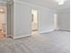 Main bedroom showcasing carpet and view into main bathroom at 162 Bluffington Way, Marietta, GA 30066