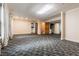 Spacious finished basement with carpet, recessed lights and doorways leading to other rooms at 288 Shire Way, Lawrenceville, GA 30044