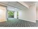 Finished basement with doorway leading to outside deck at 288 Shire Way, Lawrenceville, GA 30044