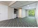 Finished basement featuring closet with washer/dryer and door to outside deck at 288 Shire Way, Lawrenceville, GA 30044