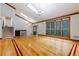 Bright living room with skylights, hardwood flooring, and a staircase leading to the upper level at 288 Shire Way, Lawrenceville, GA 30044