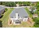Overhead shot of a home with a lovely backyard, deck, and patio area at 5791 Epping Ct, Douglasville, GA 30135