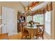 Charming breakfast nook with a round table and cozy seating by the window at 5791 Epping Ct, Douglasville, GA 30135