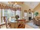 Bright breakfast nook with large windows and a view of the living space at 5791 Epping Ct, Douglasville, GA 30135