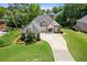 Charming single-Gathering home with a well-manicured lawn and long driveway at 5791 Epping Ct, Douglasville, GA 30135