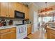 Bright eat-in kitchen featuring modern appliances, wooden cabinets, and stylish decor at 5791 Epping Ct, Douglasville, GA 30135