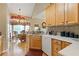Bright eat-in kitchen featuring wooden cabinets, stainless sink and faucet, and stylish decor at 5791 Epping Ct, Douglasville, GA 30135