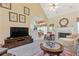 Inviting living room with comfortable seating and a view into the kitchen at 5791 Epping Ct, Douglasville, GA 30135