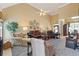 Expansive living room featuring high ceilings, comfortable seating, and natural light at 5791 Epping Ct, Douglasville, GA 30135