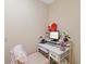 A small office with a white desk and pink accents at 5791 Epping Ct, Douglasville, GA 30135