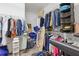 Spacious walk-in closet featuring ample shelving and rods for organized storage at 5791 Epping Ct, Douglasville, GA 30135