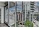 A beautiful view of the city from the balcony of this high rise condo at 950 W Peachtree Nw St # 911, Atlanta, GA 30309