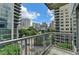 Relax on the balcony with panoramic city views from the high-rise condo at 950 W Peachtree Nw St # 911, Atlanta, GA 30309