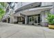 Contemporary building entrance at 930 West Peachtree St NW with glass doors and modern architecture at 950 W Peachtree Nw St # 911, Atlanta, GA 30309