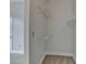 Walk-in closet with white shelving at 950 W Peachtree Nw St # 911, Atlanta, GA 30309