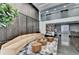 Modern lobby with a curved beige sofa, hardwood tables and an elevator at 950 W Peachtree Nw St # 911, Atlanta, GA 30309