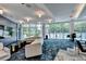 The spacious community lounge features stylish furniture, great for socializing at 950 W Peachtree Nw St # 911, Atlanta, GA 30309