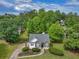 Aerial view of this beautiful home surrounded by lush greenery and a well-maintained lawn at 100 Sydney Smt, Villa Rica, GA 30180