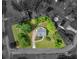 Aerial view highlighting the home, boundaries and surrounding lush landscape, and neighborhood at 100 Sydney Smt, Villa Rica, GA 30180