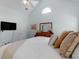 Bedroom with neutral tones, featuring a comfortable bed with plush pillows and a television at 100 Sydney Smt, Villa Rica, GA 30180