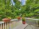 Inviting outdoor deck with a view of lush greenery, perfect for enjoying nature at 100 Sydney Smt, Villa Rica, GA 30180