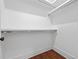 Spacious walk-in closet with ample shelving and hanging space at 10350 Alvin Rd, Johns Creek, GA 30022