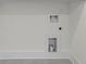 Basement laundry room with laundry hookups at 10350 Alvin Rd, Johns Creek, GA 30022