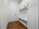 Mudroom with storage featuring a bench, cubbies, hooks and shoe shelves at 10350 Alvin Rd, Johns Creek, GA 30022