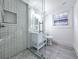 Modern bathroom with tiled shower, a window and modern vanity at 2400 Glenrock Dr, Decatur, GA 30032